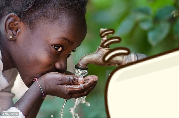 girl drinking clean water from a tap Teso Elites Development Association - Teso Elites Development Association