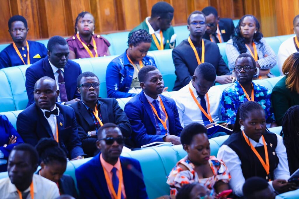 youth delegates seated in parliament chamber teda - Teso Elites Development Association